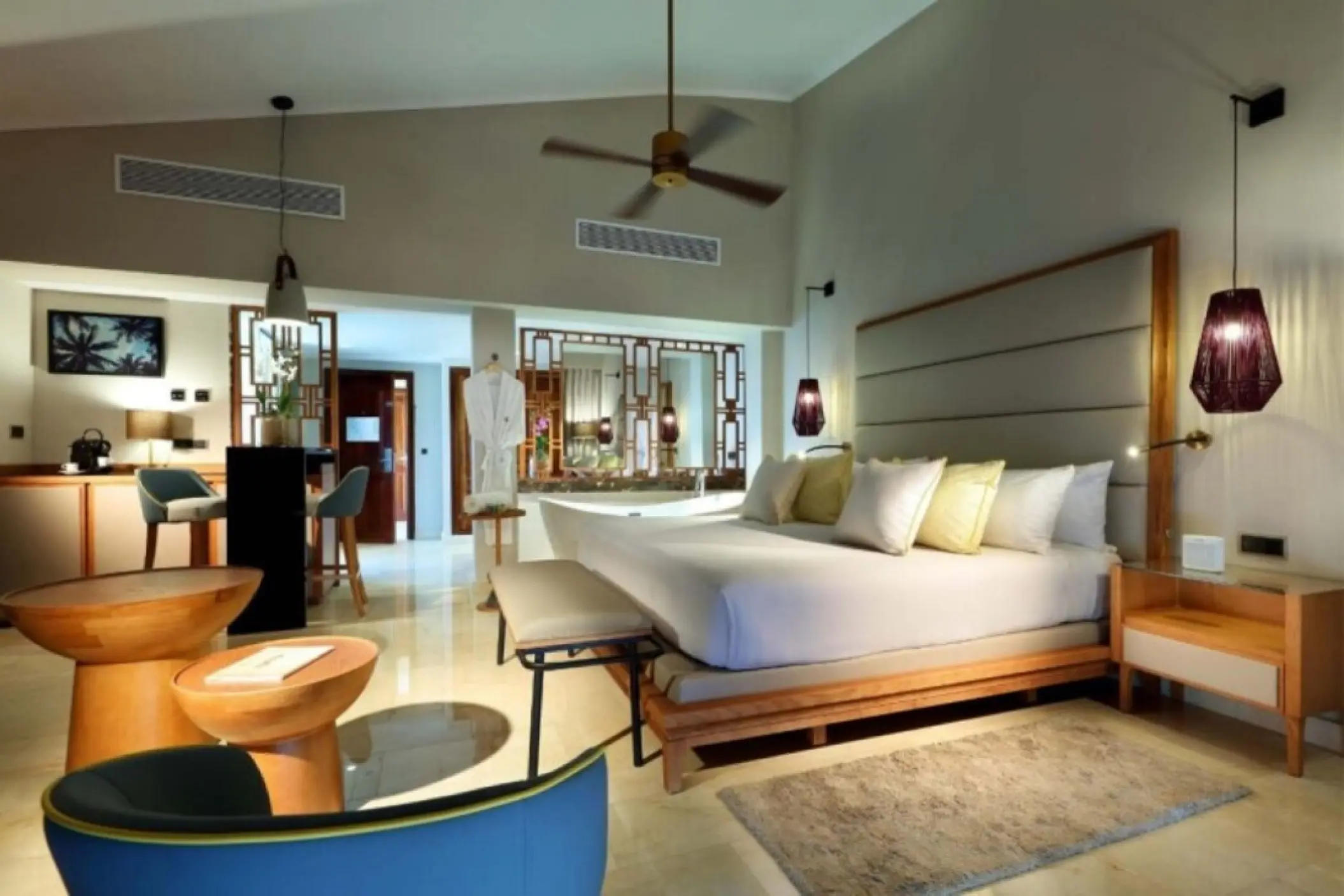 Premium Junior Suite with king bed and modern decor at Grand Palladium Punta Cana