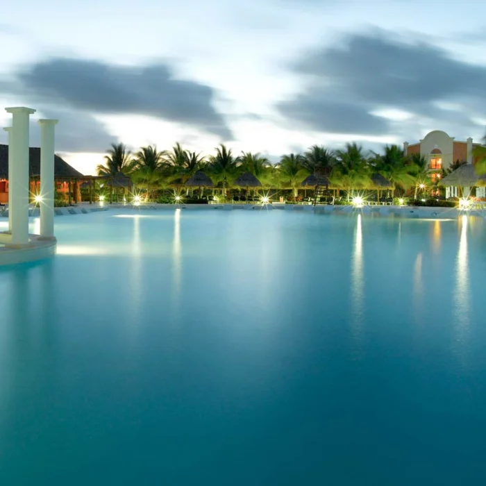 the beautiful pool in the evening at grand palladium kantenah resort