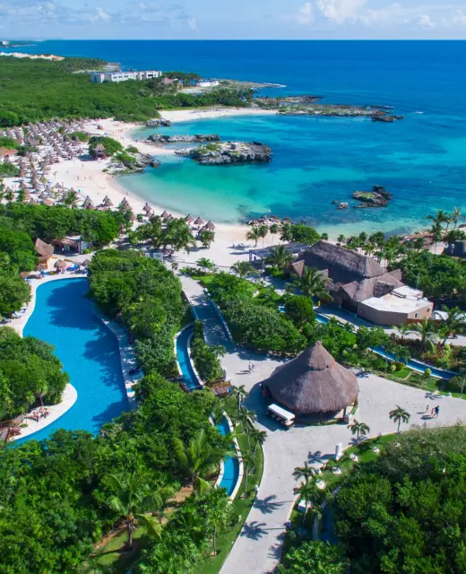 aerial view of Grand Sirenis Riviera Maya with its beach and lazy river and accommodations