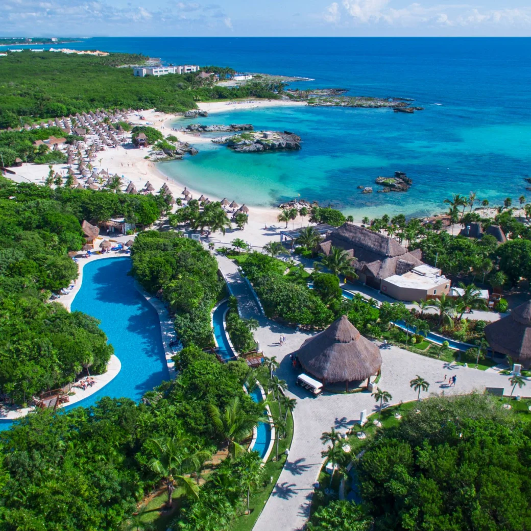 aerial view of Grand Sirenis Riviera Maya with its beach and lazy river and accommodations