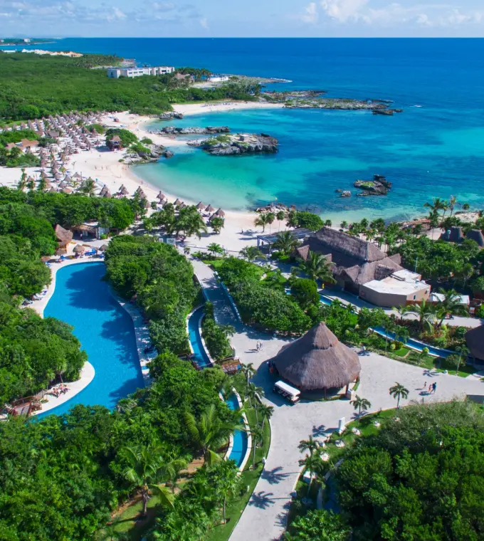 Aerial view of Grand Sirenis Riviera Maya pools, beachfront, and tropical grounds, Riviera Maya