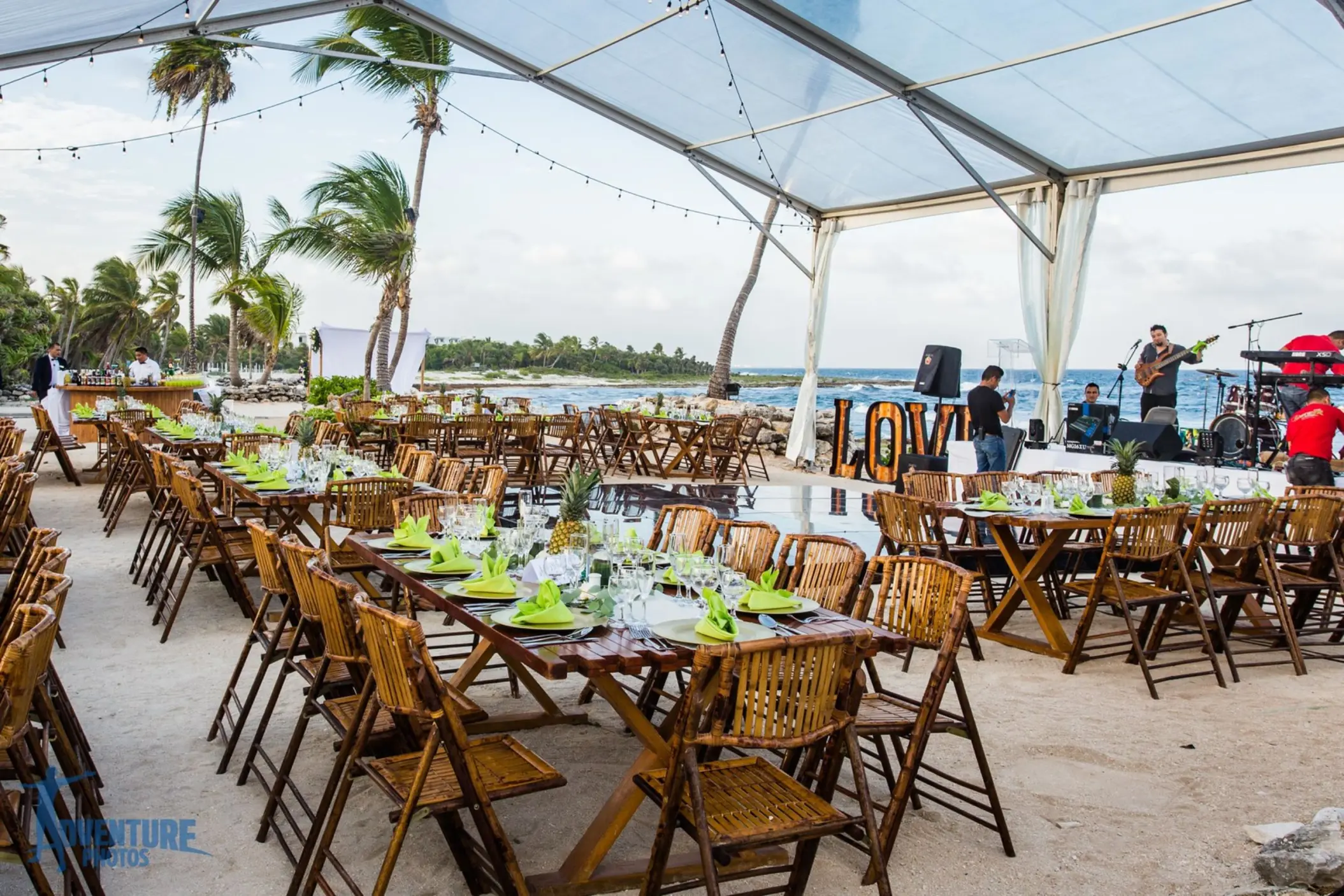 Beachfront wedding reception under a clear marquee at Grand Sirenis, Riviera Maya