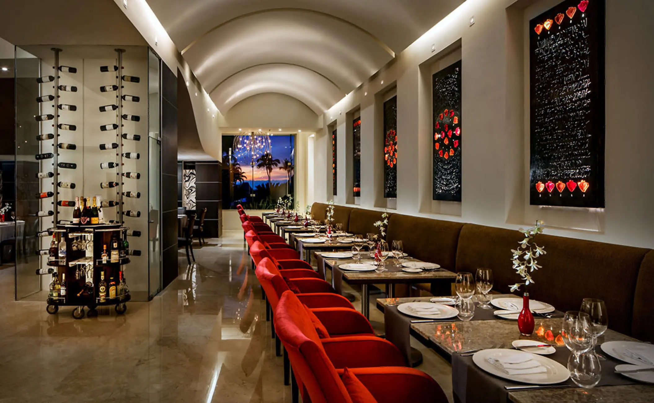 Piaf restaurant with vaulted ceilings and red velvet seating at Grand Velas Riviera Nayarit, Puerto Vallarta