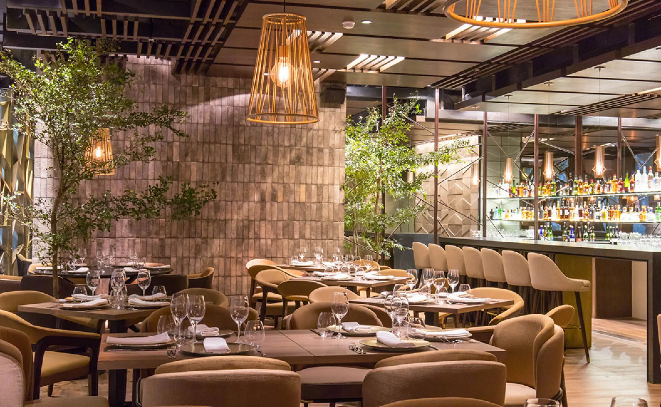 Modern indoor dining room and bar area at Grand Velas Riviera Nayarit, Puerto Vallarta