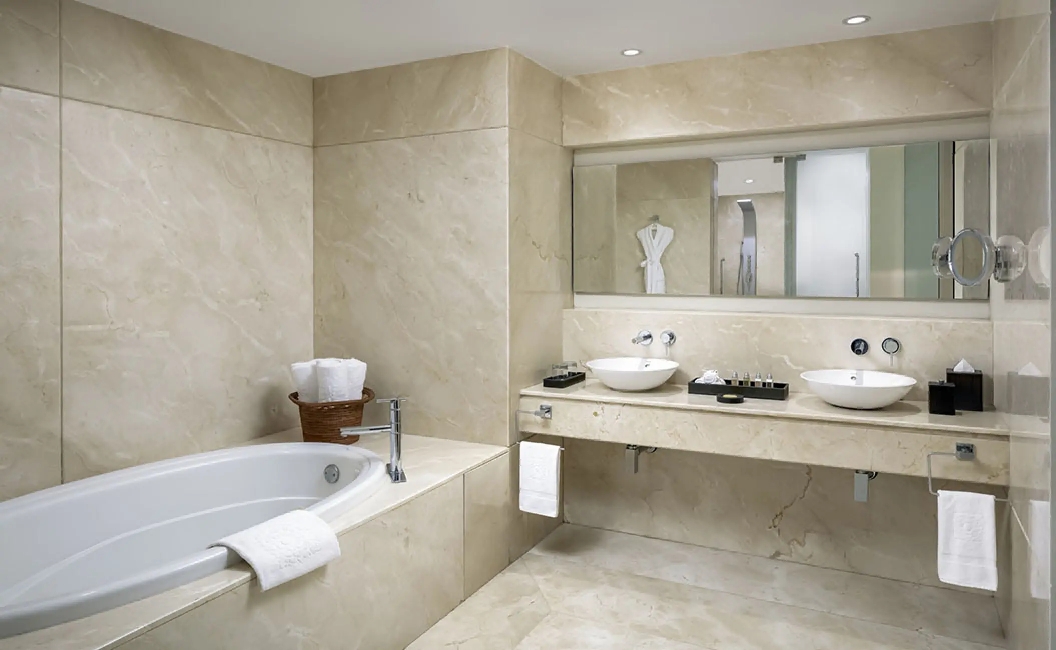 Grand Velas Riviera Nayarit suite bathroom with marble finishes and a soaking tub, Puerto Vallarta