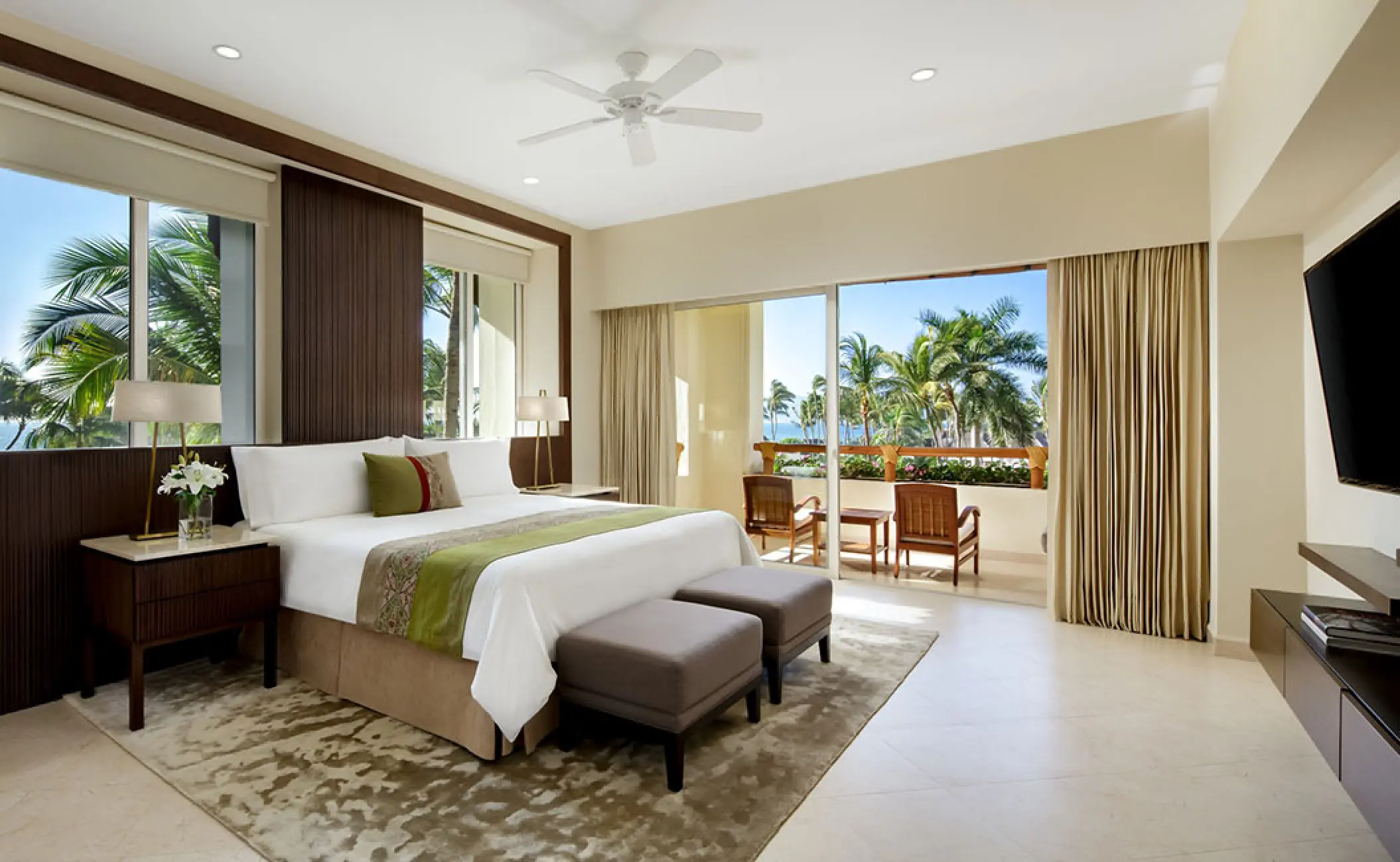 Grand Velas Riviera Nayarit governor suite with balcony overlooking palm trees, Puerto Vallarta