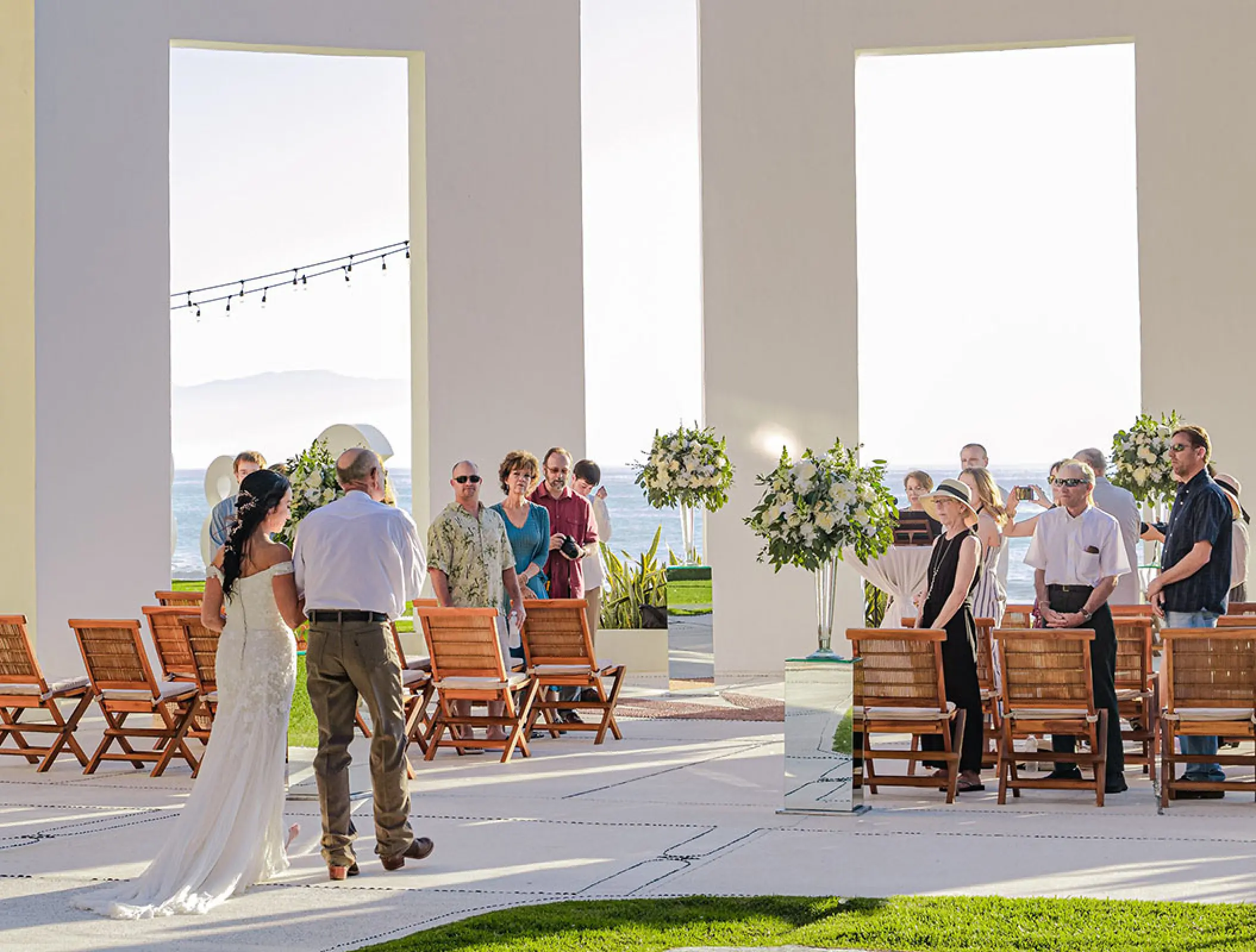 Bride walking down the aisle at a Grand Velas Riviera Nayarit wedding ceremony, Puerto Vallarta