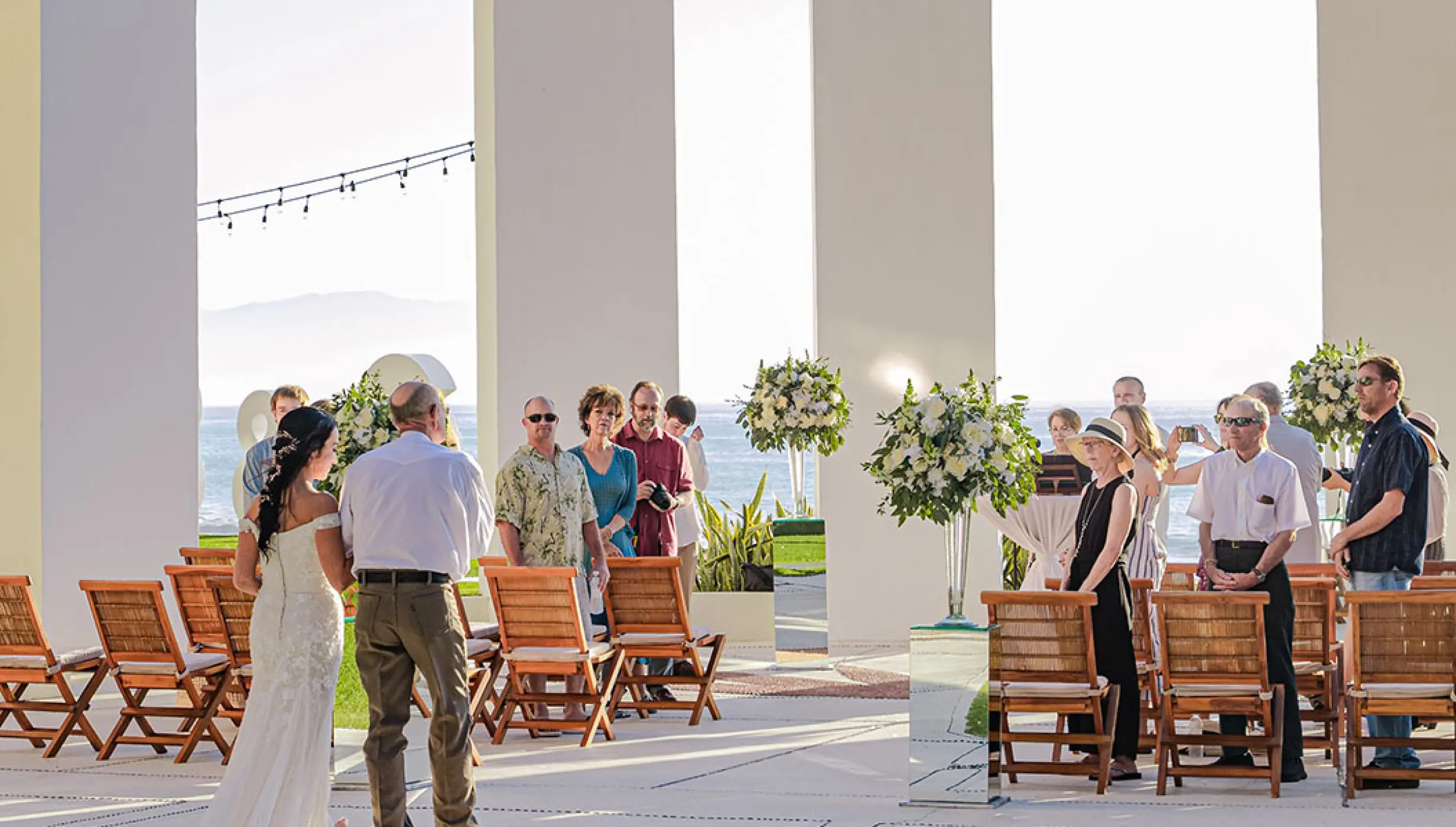 Bride walking down the aisle at a Grand Velas Riviera Nayarit wedding ceremony, Puerto Vallarta