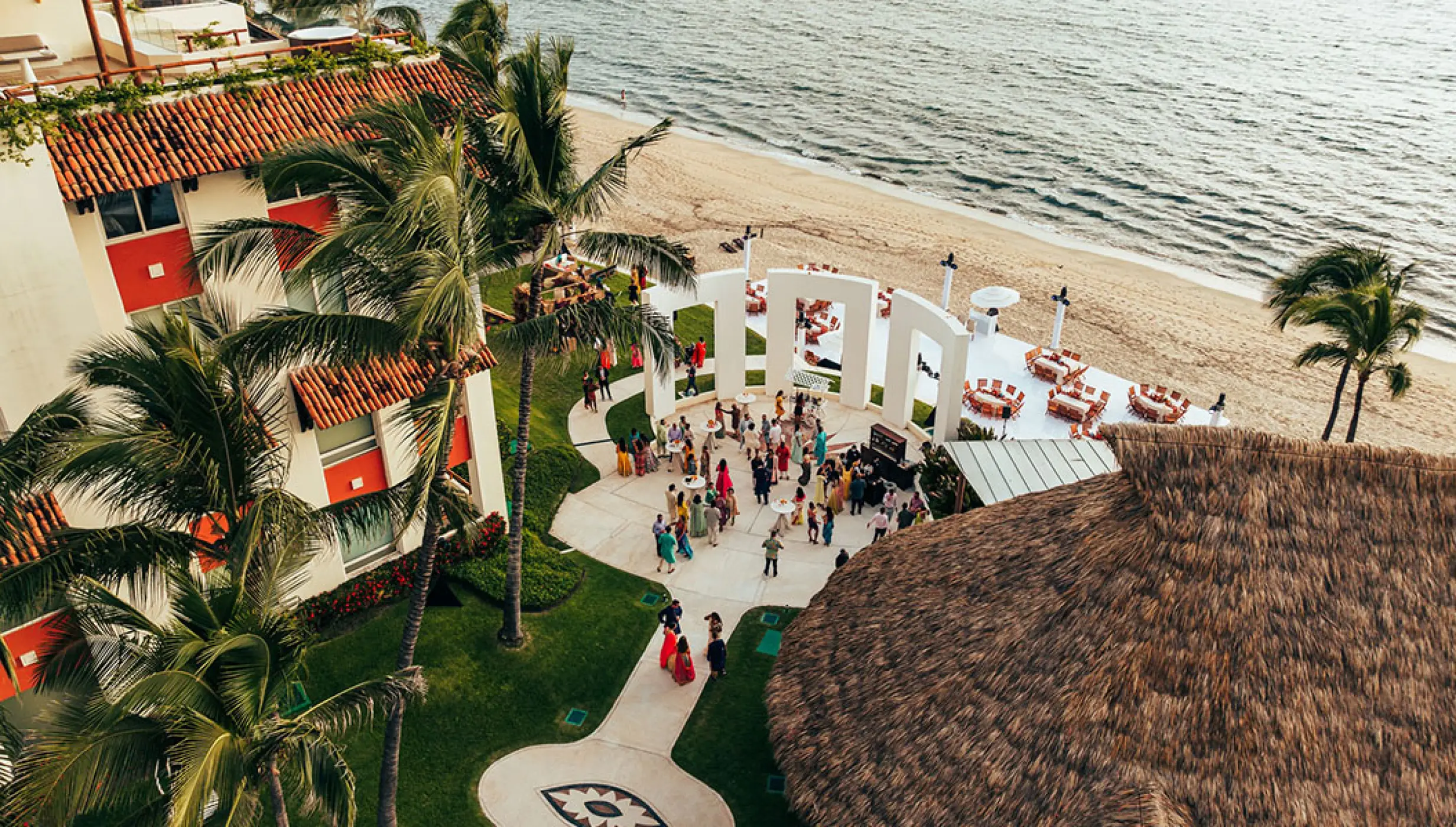 Aerial view of a beachfront wedding reception at Grand Velas Riviera Nayarit, Puerto Vallarta
