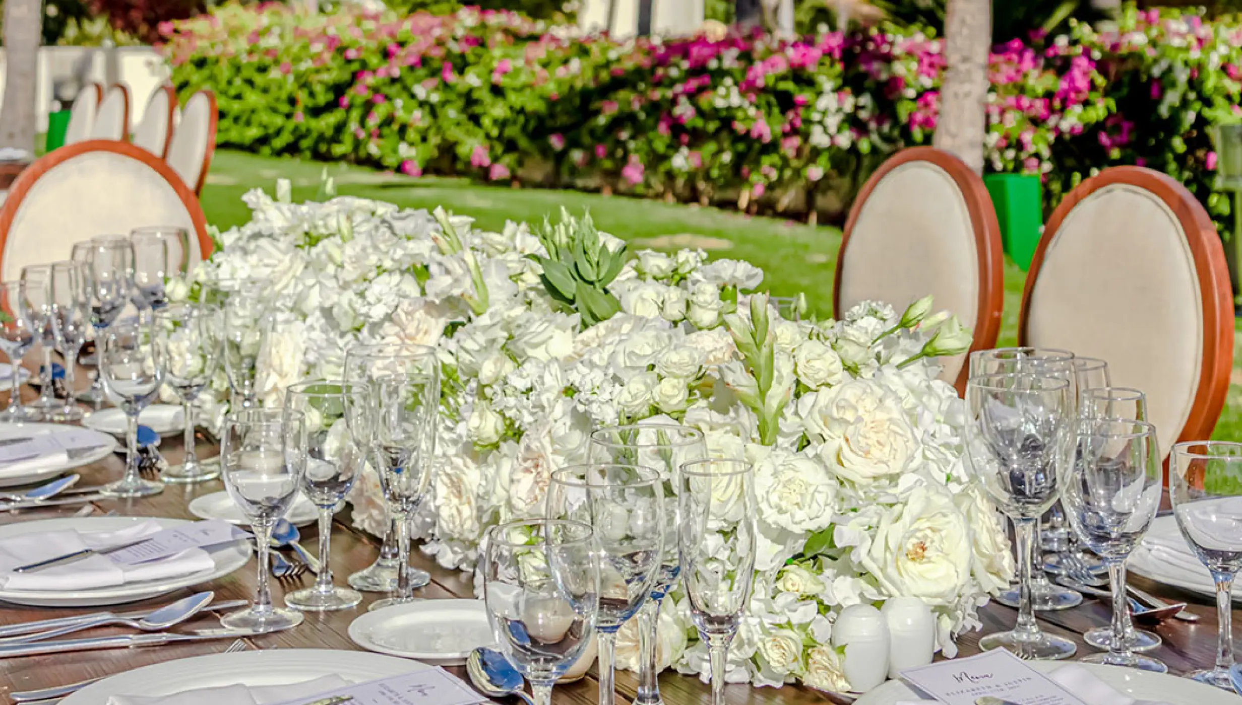 White floral table runner for a wedding reception at Grand Velas Riviera Nayarit, Puerto Vallarta
