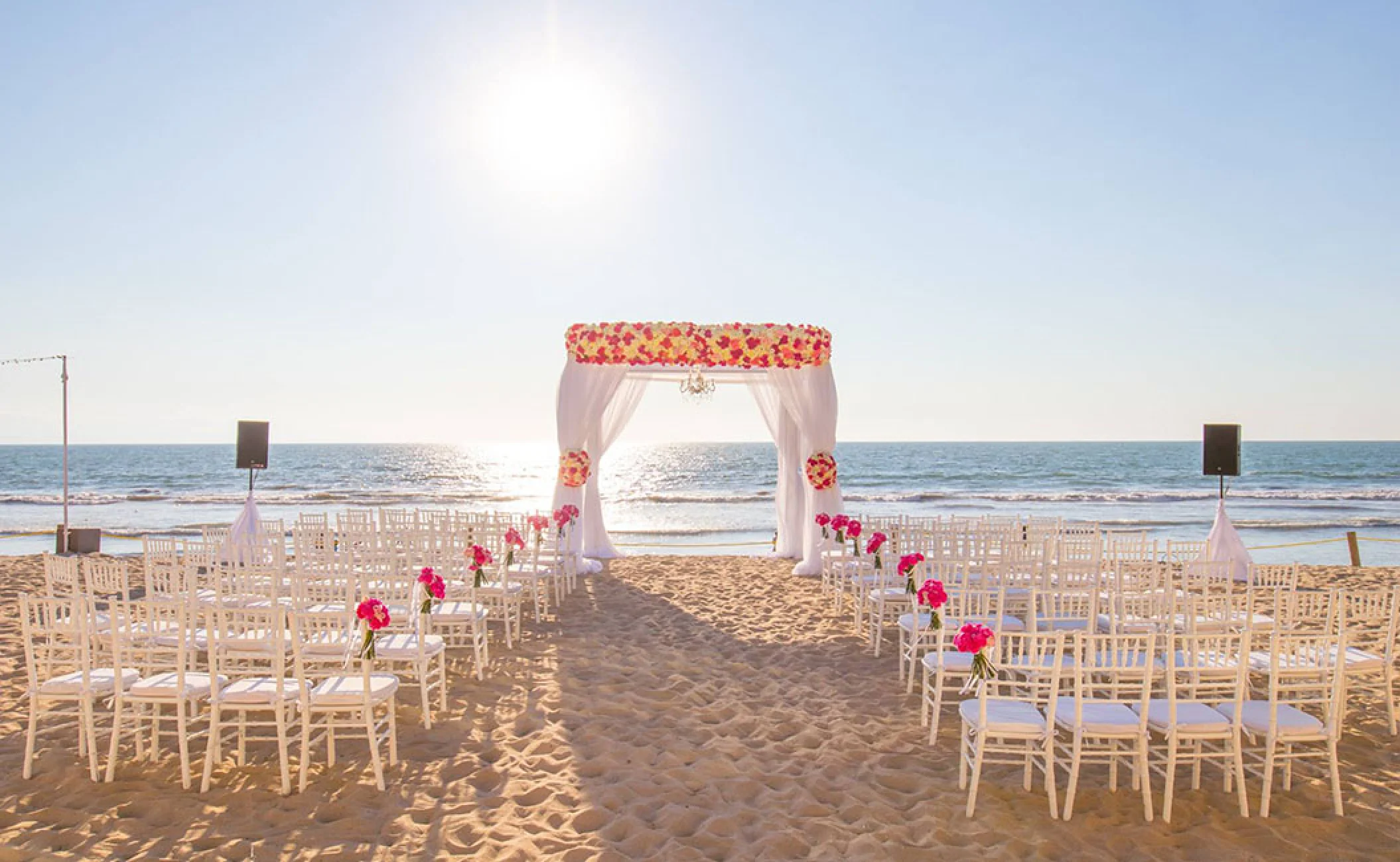Beach wedding setup at Grand Velas Riviera Nayarit.