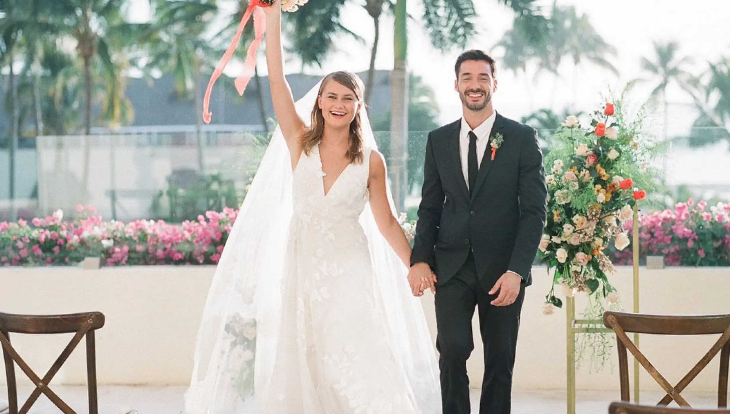 The bride and groom celebrating on the Sky Terrace at Grand Velas Riviera Nayarit, Puerto Vallarta