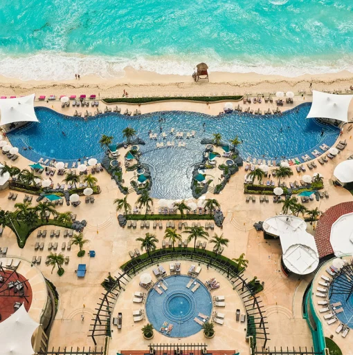 Drone shot of beach and pool of Hard Rock Cancun