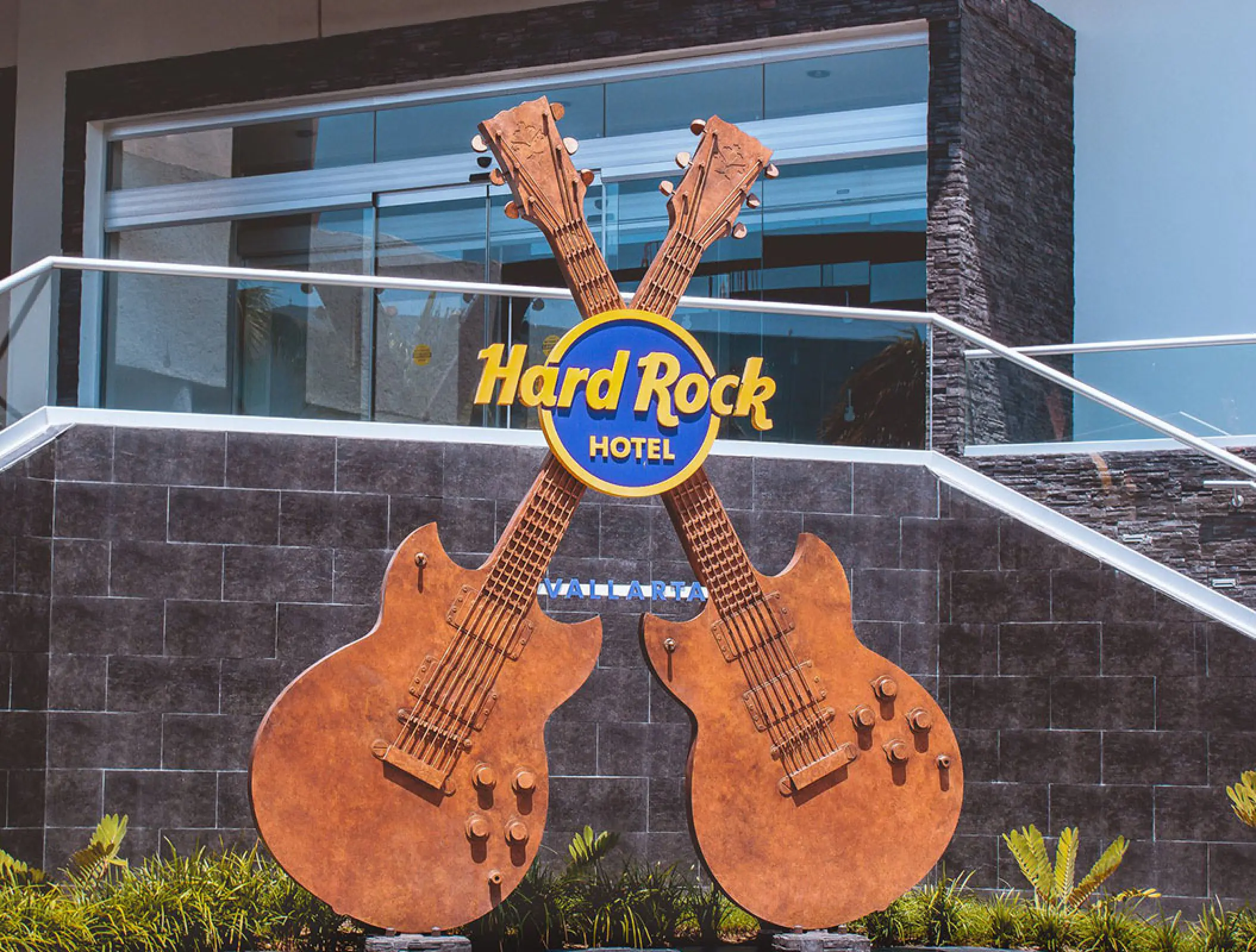 Hard Rock Hotel Vallarta logo and crossed guitar sculpture in front of the resort, Puerto Vallarta