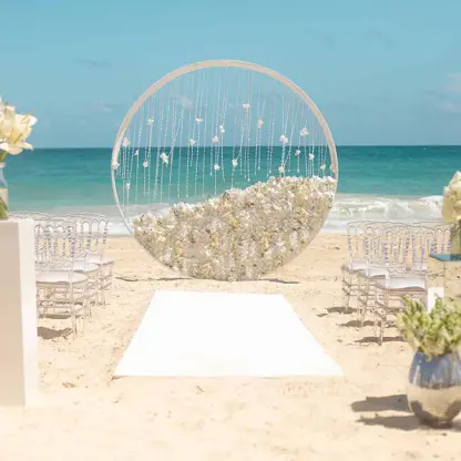 Circular floral arch for a beach ceremony at Hard Rock Vallarta, Puerto Vallarta