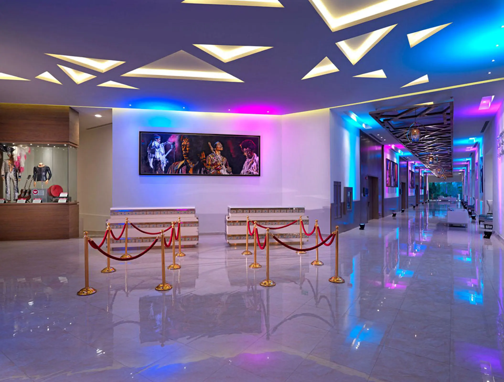 Modern sanctuary foyer with neon lighting and memorabilia at Hard Rock Vallarta, Puerto Vallarta
