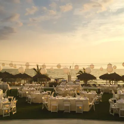 Palm Terrace wedding reception with lantern strings at Hard Rock Vallarta, Puerto Vallarta