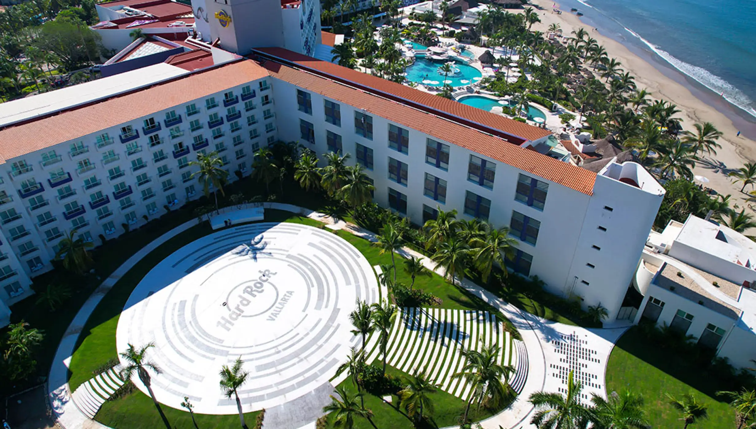 Aerial view of Hard Rock Hotel Vallarta terrace, pools and beach, Puerto Vallarta