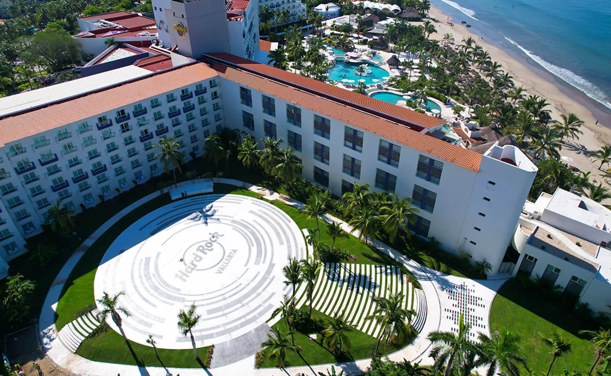 Aerial view of Hard Rock Hotel Vallarta terrace, pools and beach, Puerto Vallarta