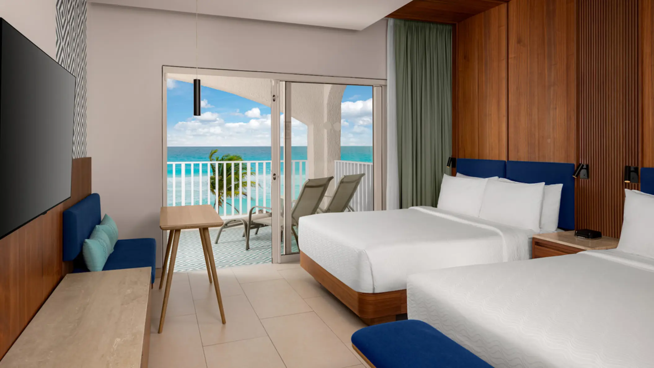 Suite with two double beds and oceanview balcony at Hilton Cancun Mar Caribe, Cancun
