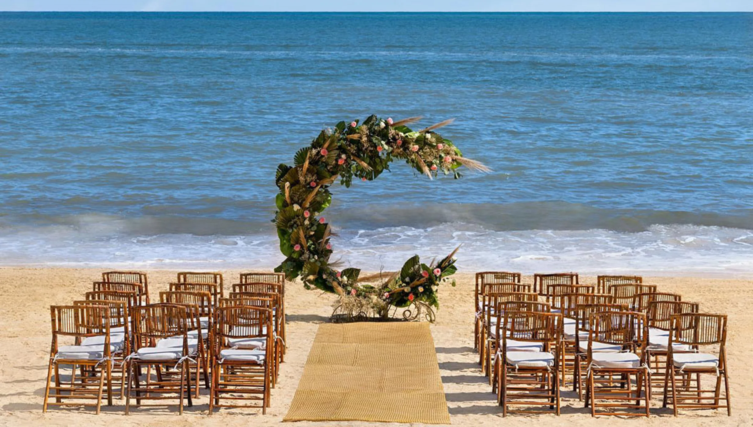 Ceremony setup on the Beach Venue at Hilton Cancun