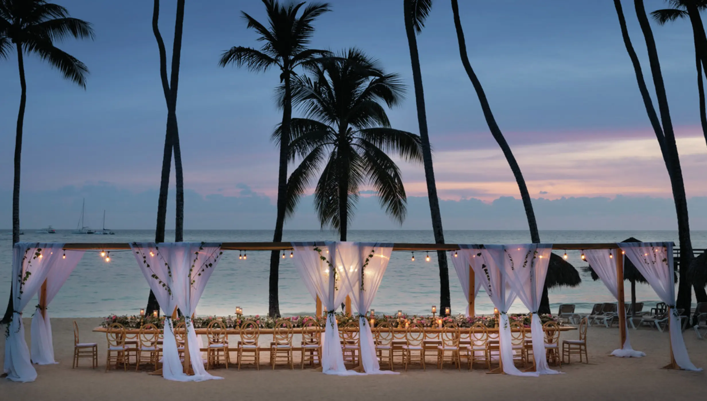 beach area venue with reception setup at Dreams La Romana Resort & Spa