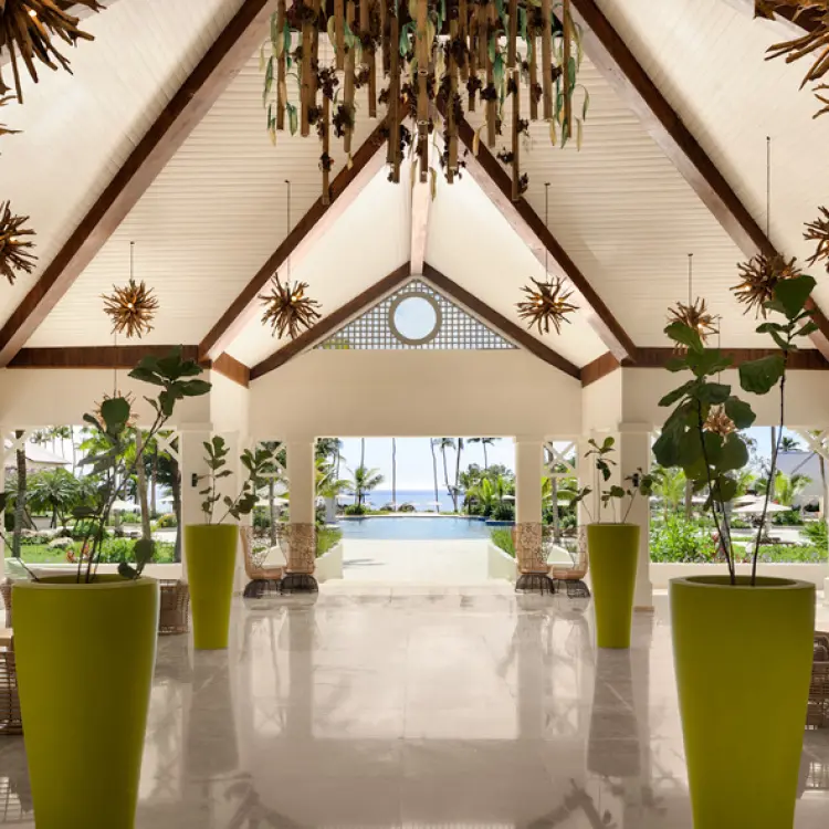 Main lobby lounge with vaulted ceilings and ocean views at Hilton La Romana, La Romana