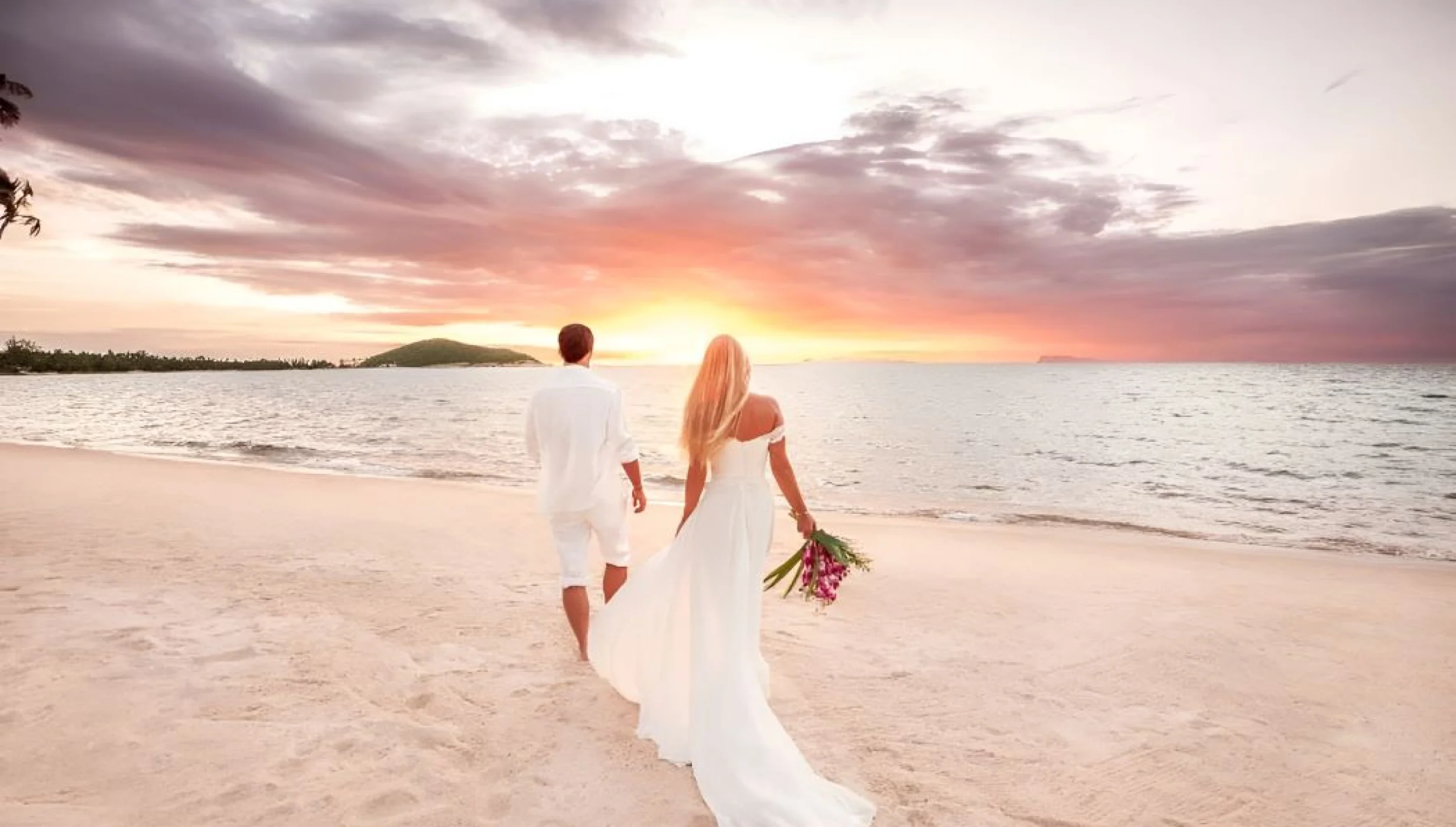 bride and groom during sunrise