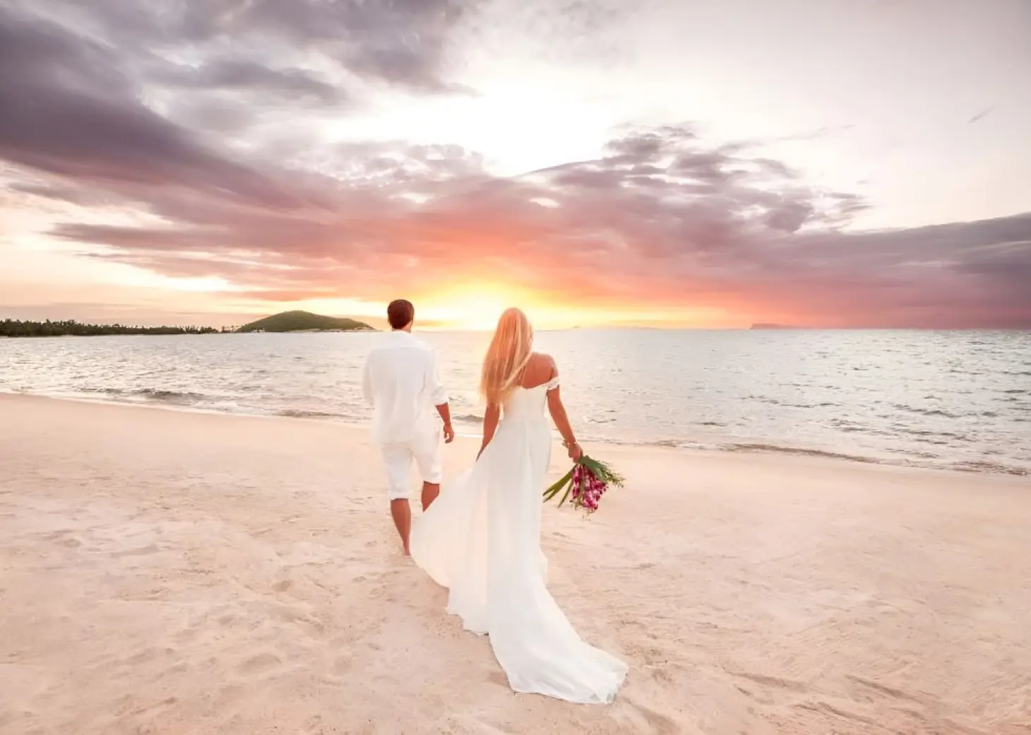 bride and groom during sunrise