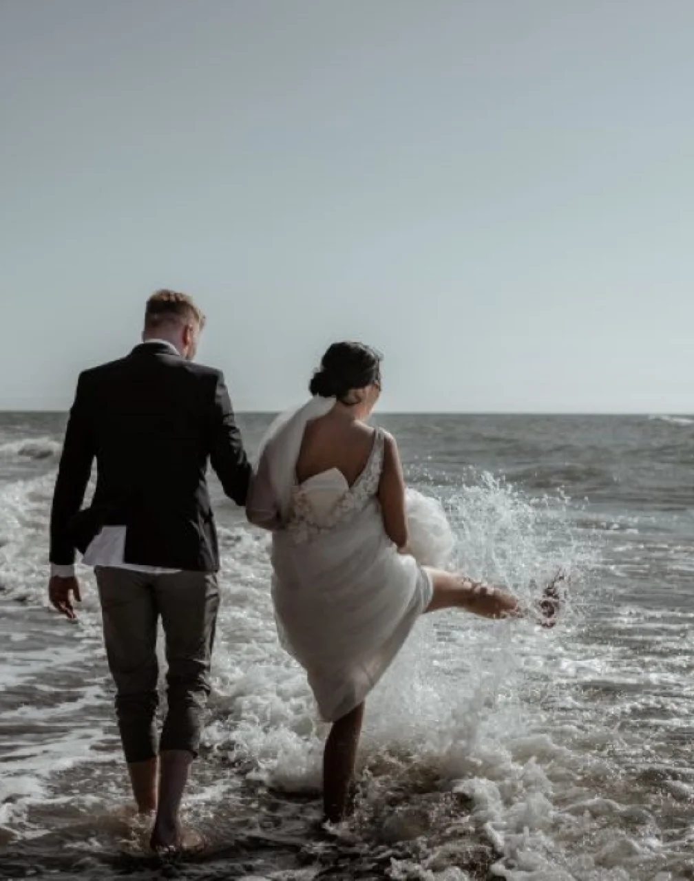 bride and groom on the beach