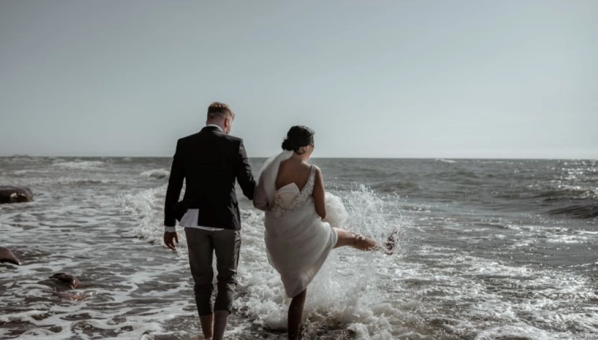 bride and groom on the beach