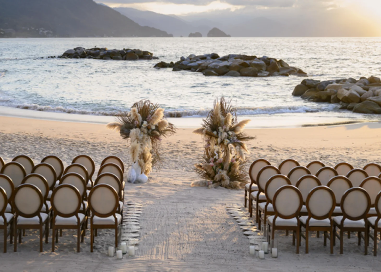 Ceremony decor on the beach wedding venue at Hilton Vallarta Riviera