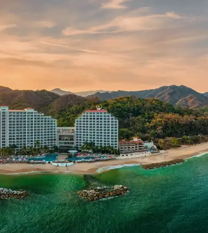 Hilton Vallarta Riviera beachfront exterior at sunset, Puerto Vallarta