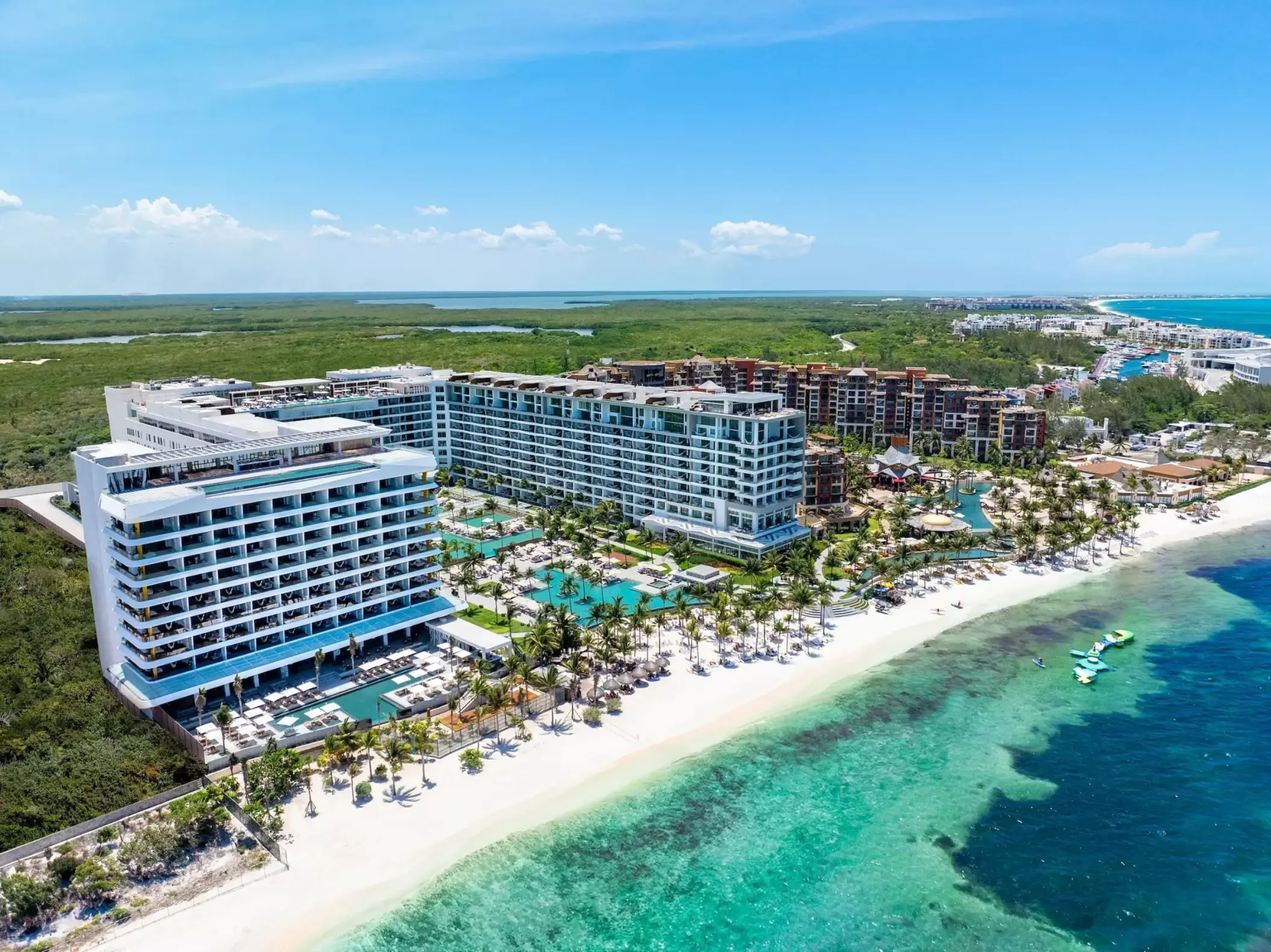 Aerial view of Hotel Mousai Cancun beachfront and pools, Cancun