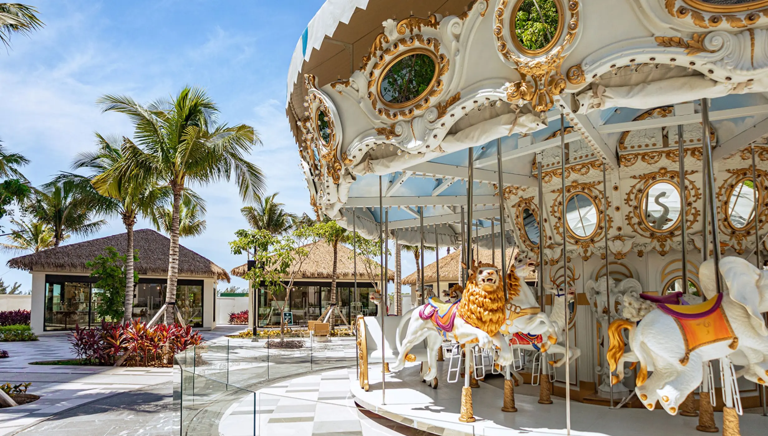 Ornate white carousel at the Tierra Luna wedding venue at Hotel Mousai Cancun