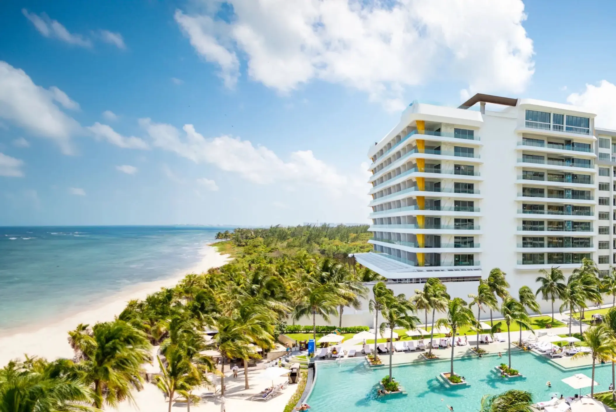 Aerial view of Hotel Mousai Cancun exterior and swimming pool beside the beach, Cancun