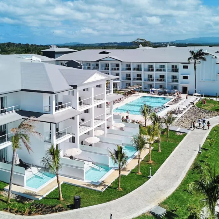 exterior view of the accommodations, swim-out suites, and gardens at Hotel Riu Negril