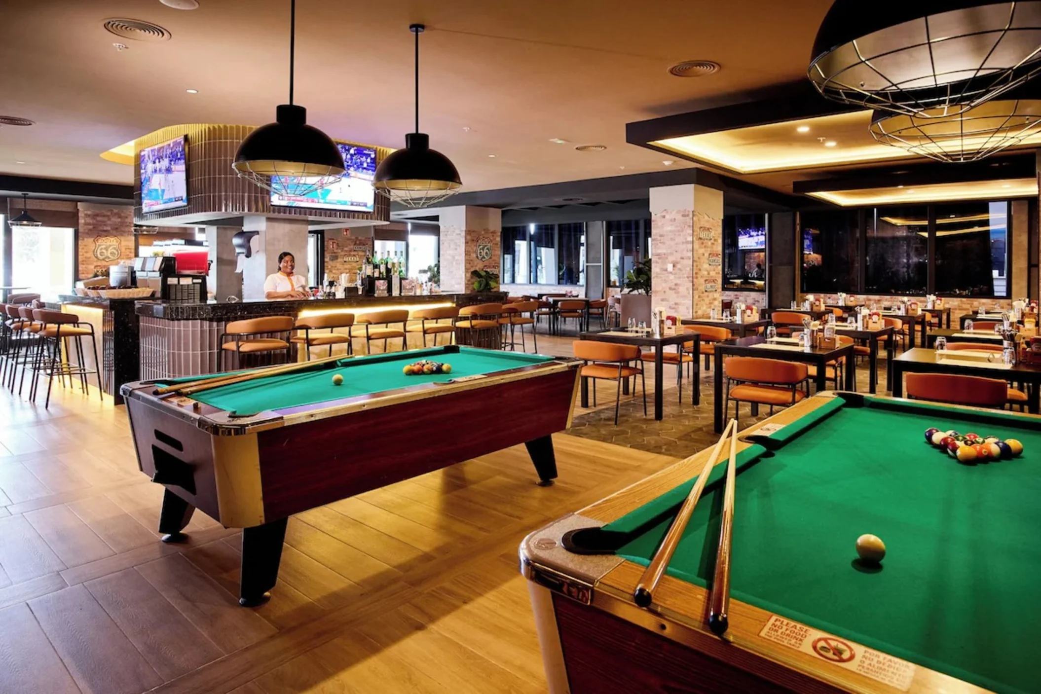 Bar with pool tables at Hotel Riu Negril