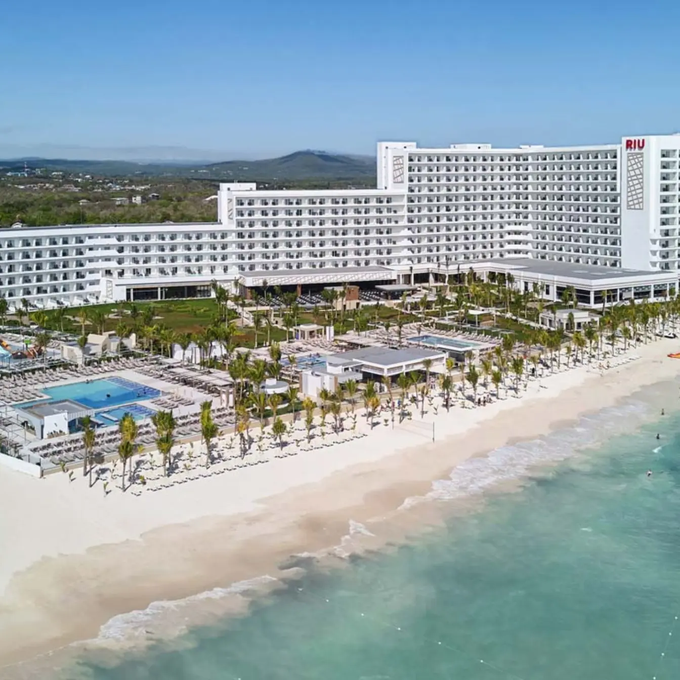 Aerial view of Riu Palace Aquarelle buildings, pools, and beachfront, Montego Bay