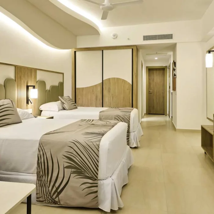 junior suite with two beds at Riu Palace Aquarelle Hotel