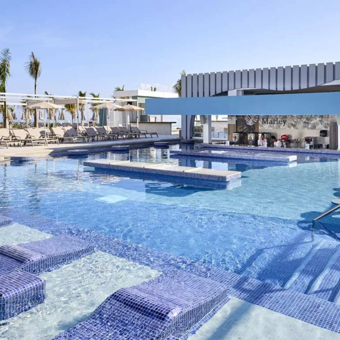 pool with swim up bar at Riu Palace Aquarelle Hotel