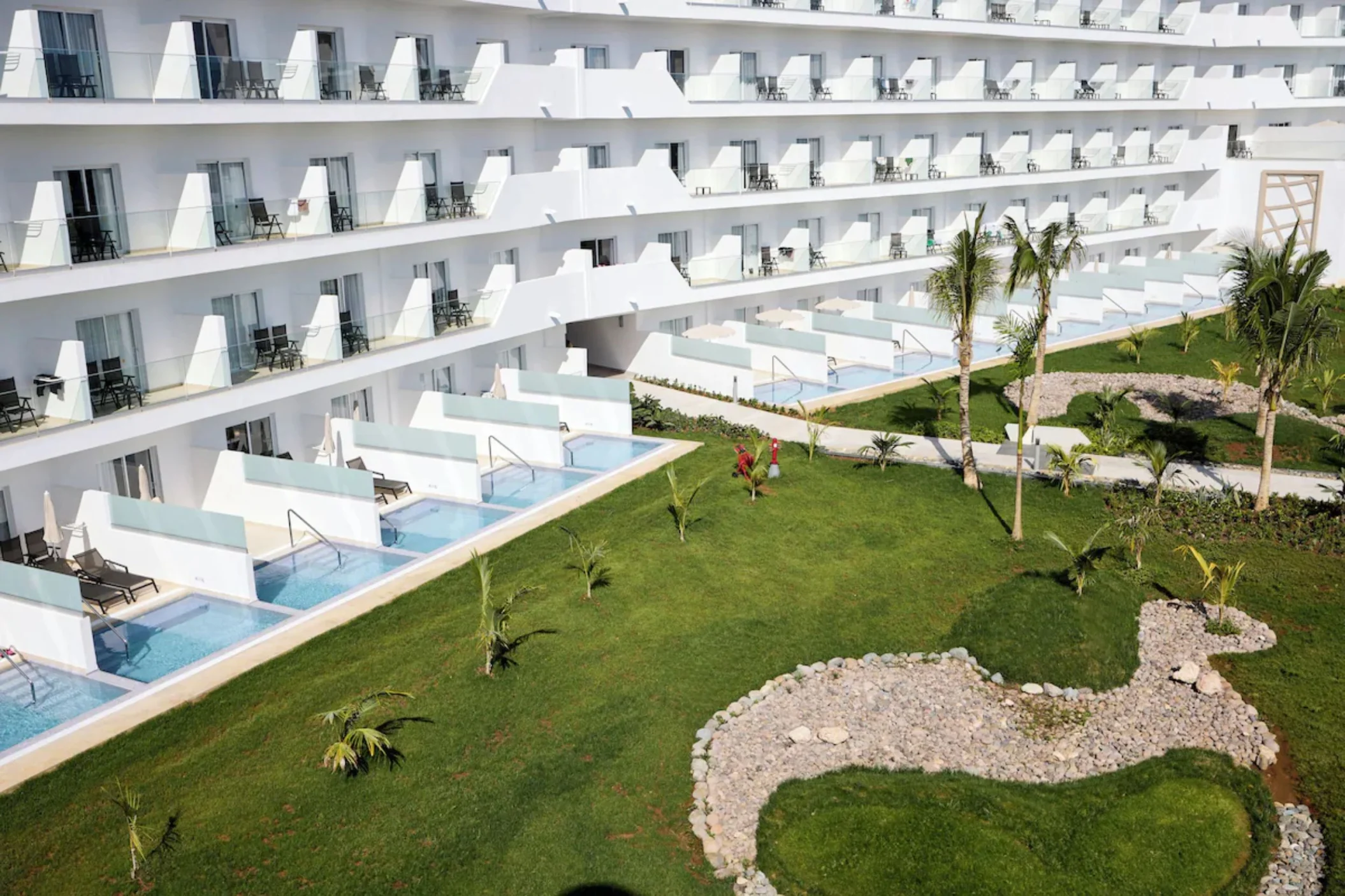 swim out suites and landscaped gardens at Riu Palace Aquarelle Hotel