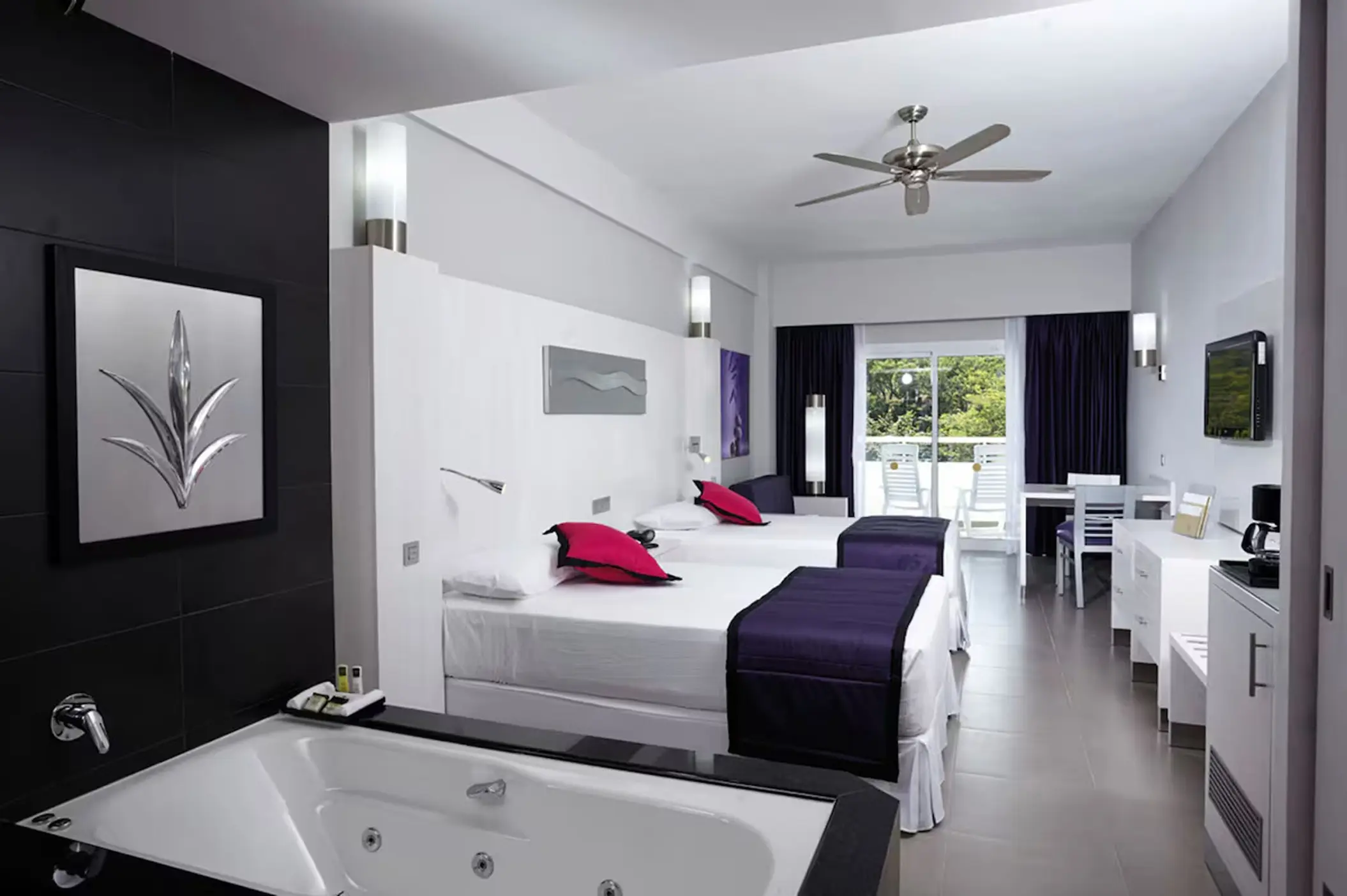 suite with 2 beds at Hotel Riu Palace Costa Rica