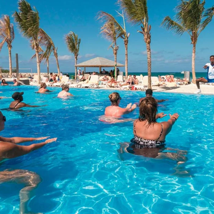 people enjoying aqua aerobics at the oceanfront pool at Hotel Riu Reggae