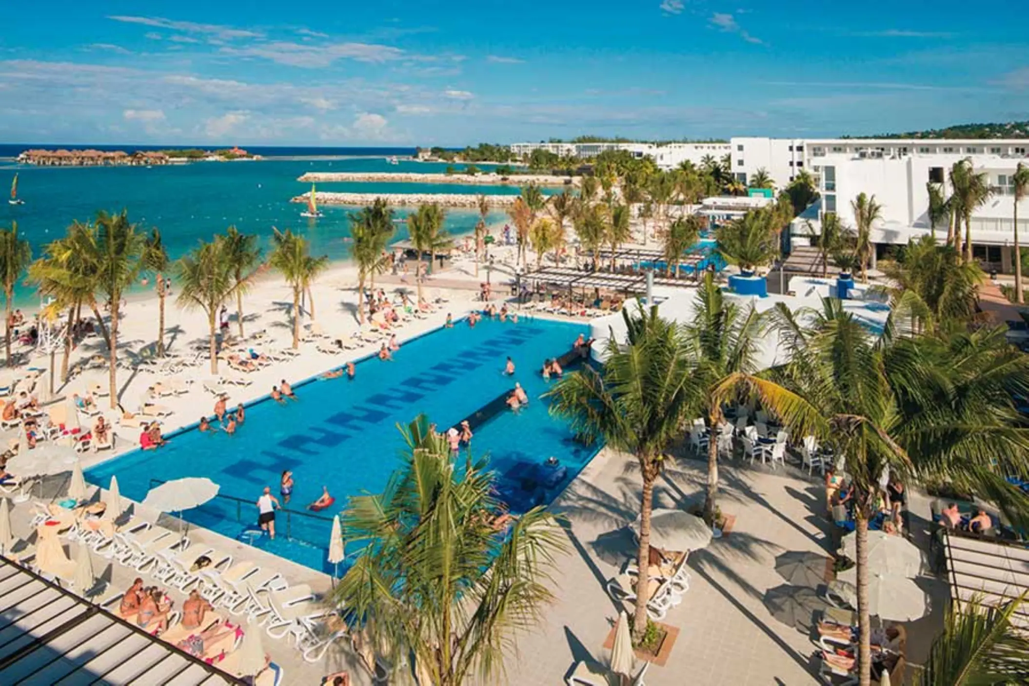 Riu Reggae beachfront pool and white sand beach, Montego Bay
