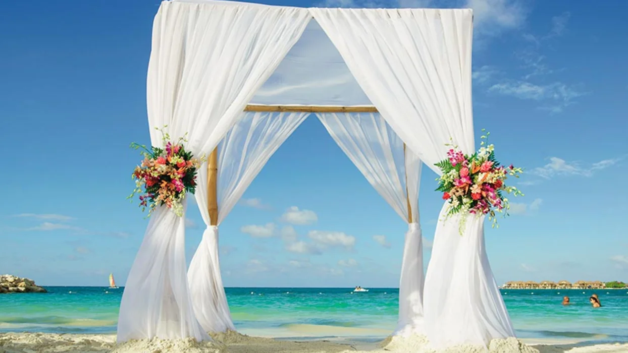wedding ceremony setup on the beach at Hotel Riu Reggae