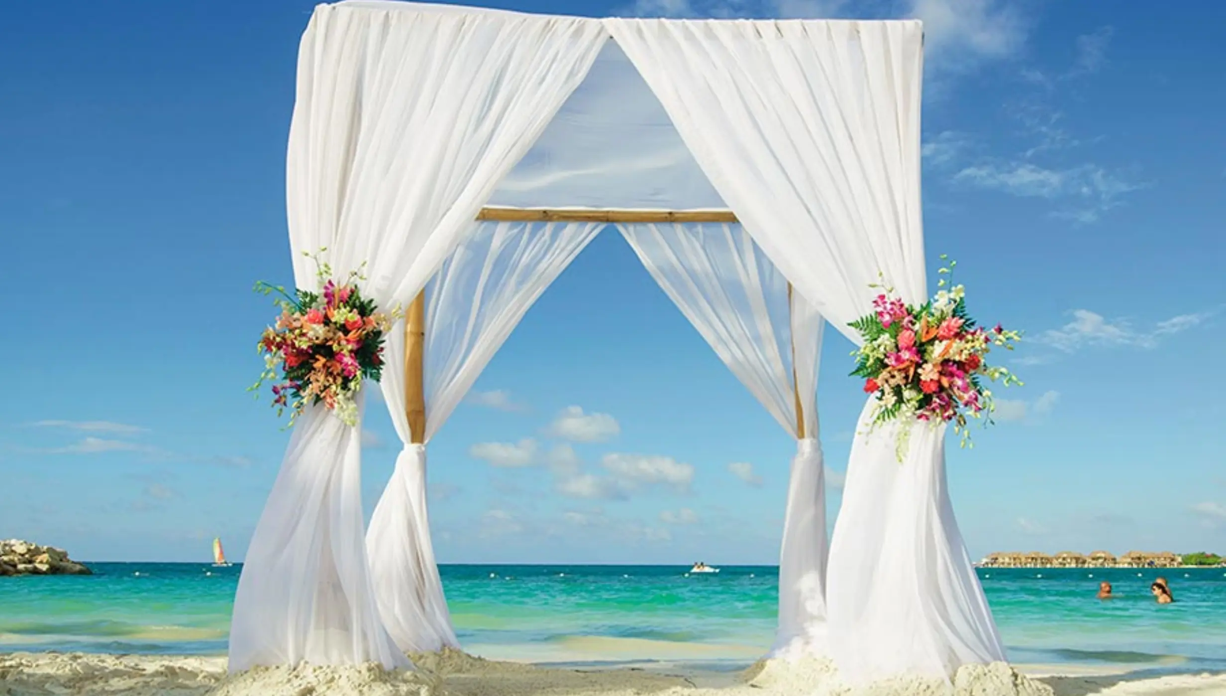 wedding ceremony setup on the beach at Hotel Riu Reggae
