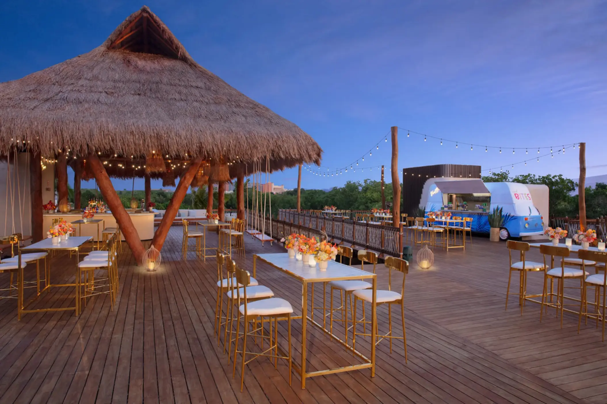 Amber Bar and Vivid Bites cocktail setup on the wooden deck at Hyatt Vivid Grand Island, Cancun