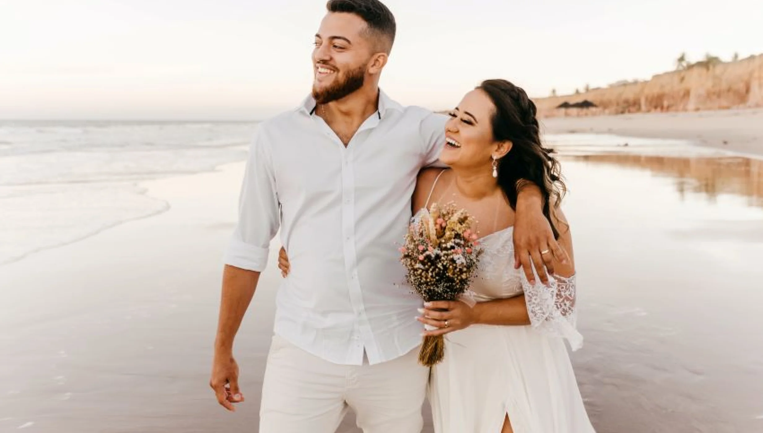bride and groom on the beach