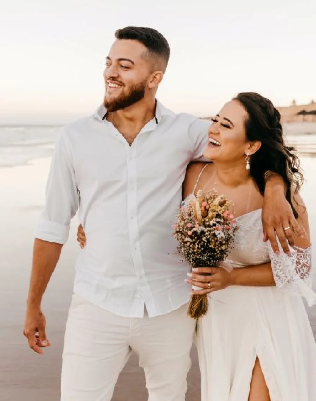 bride and groom on the beach